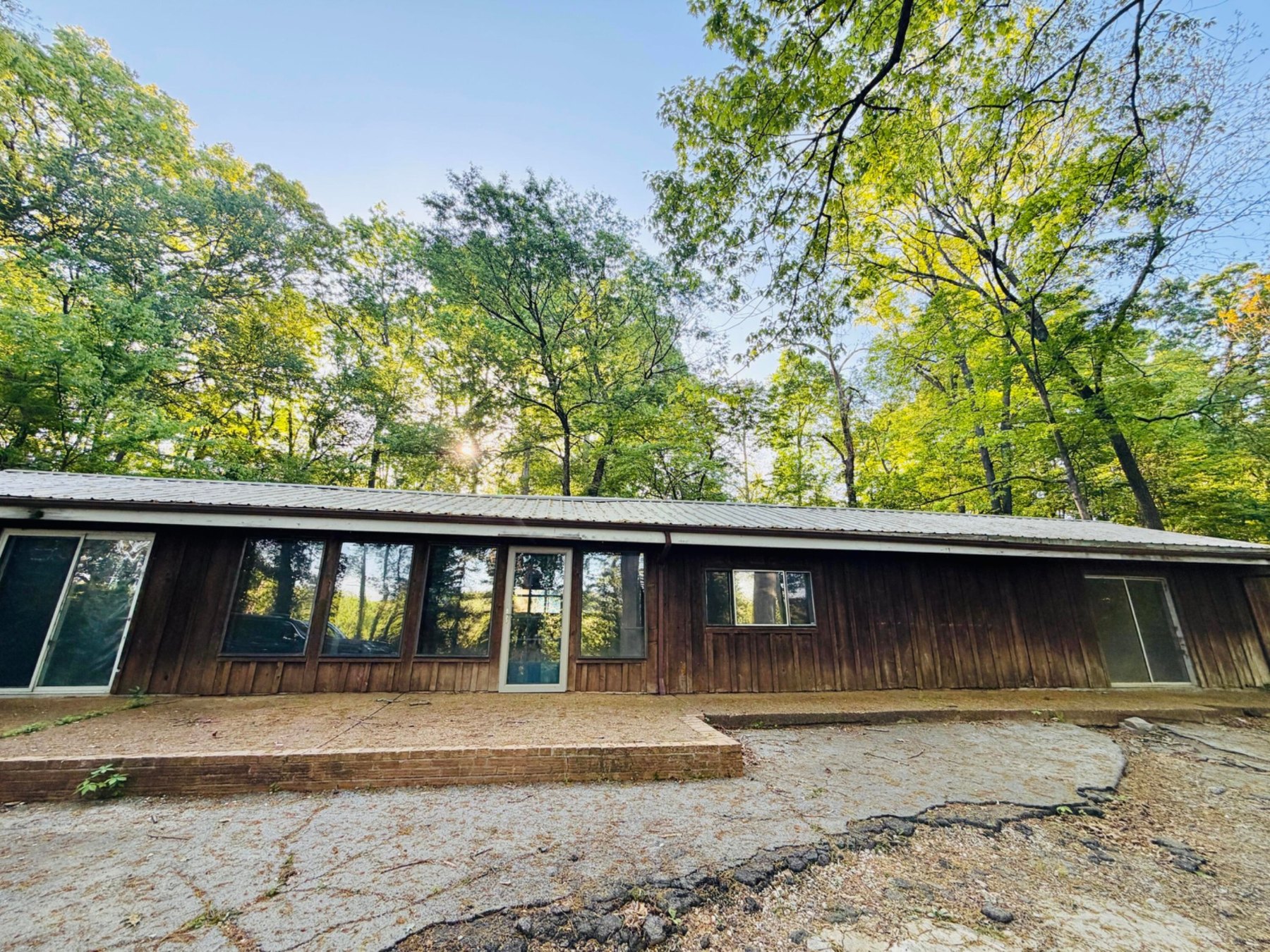 Front exterior of the single-level home at 6504 Oak Drive